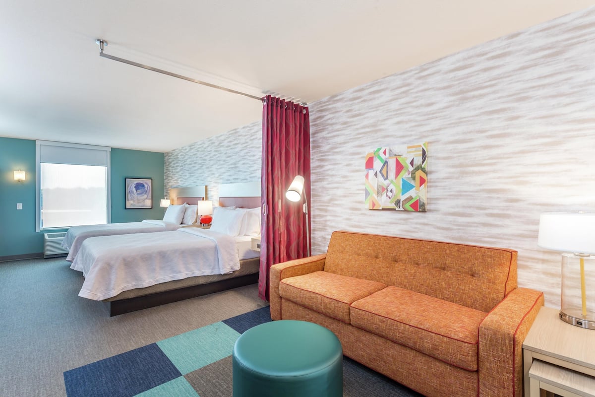 Studio, 2 Queen Beds, Non Smoking | Living area | 50-inch flat-screen TV with cable channels, TV