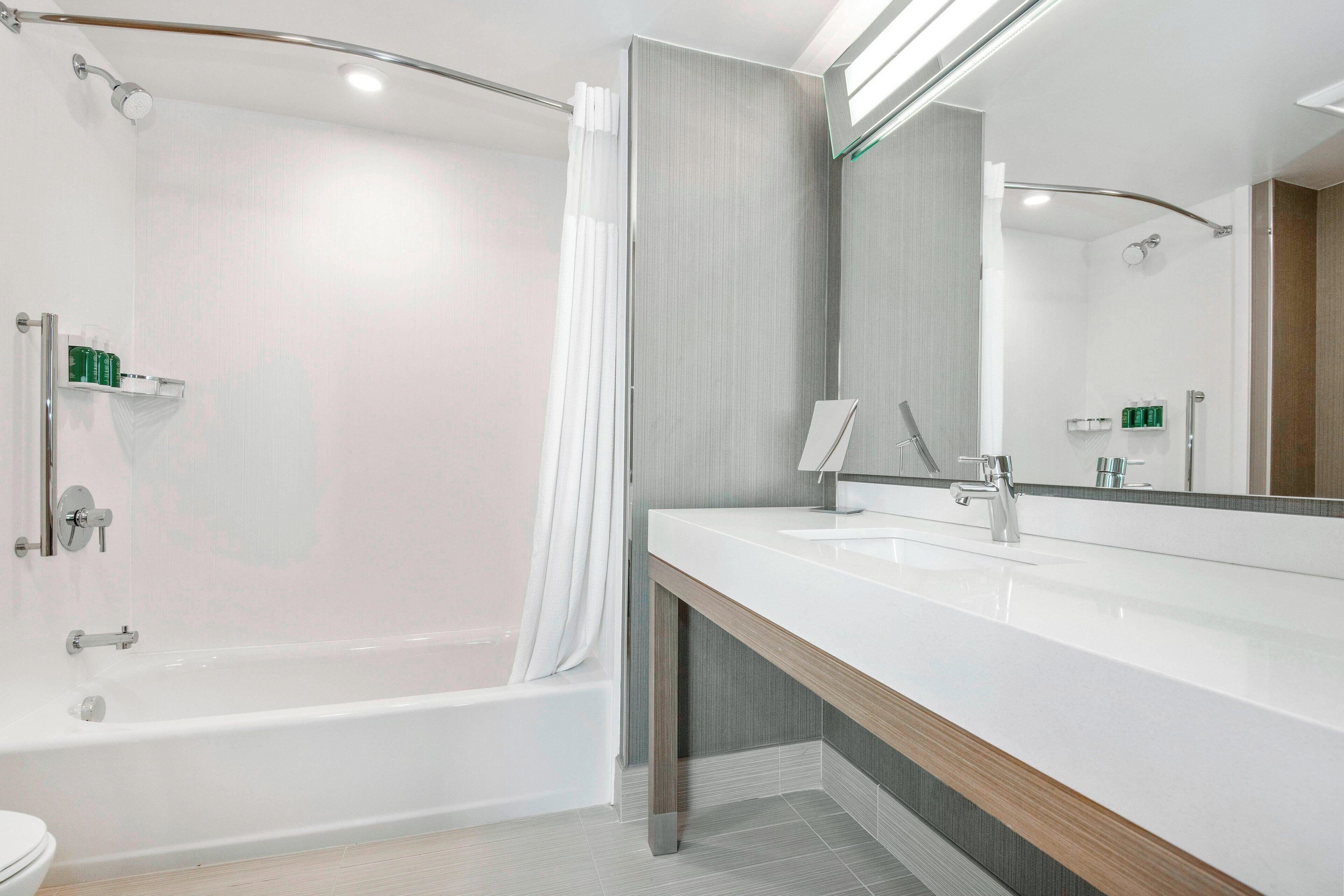 combined shower/bathtub, free toiletries, hair dryer, towels