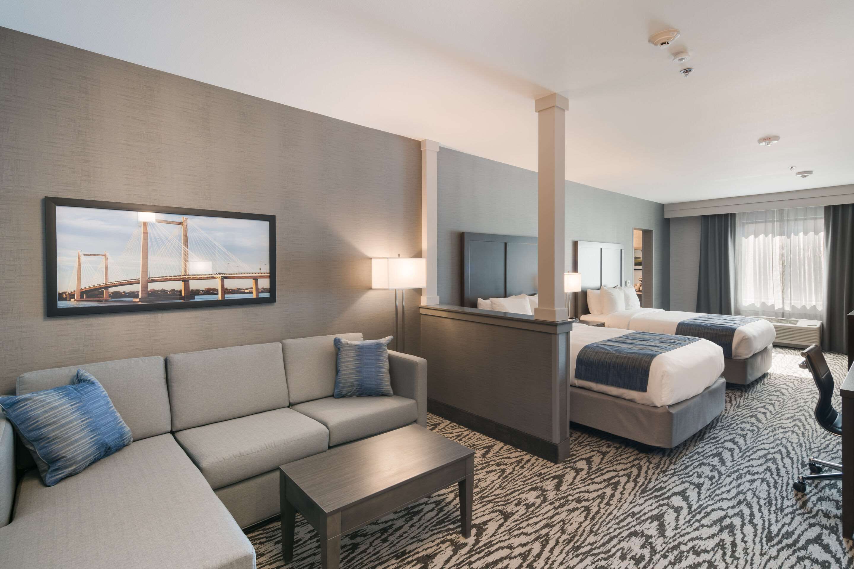 Desk, laptop workspace, blackout drapes, iron/ironing board