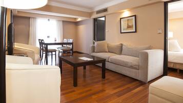 Suíte | Área de estar | TV de tela plana