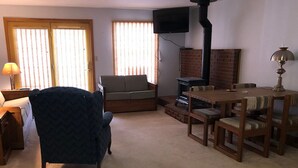 Quarto | Área de estar | TV