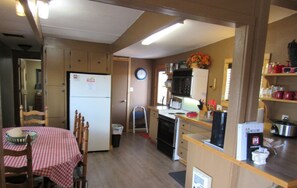 Room | Private kitchen | Fridge, microwave, coffee/tea maker - Uncle Billy Bob's Redneck Trailers Vacation Rentals #2 (Garden Valley)