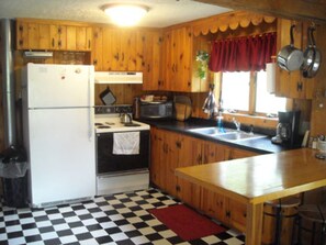 Habitación | Cocina privada | Frigorífico, microondas y cafetera o tetera