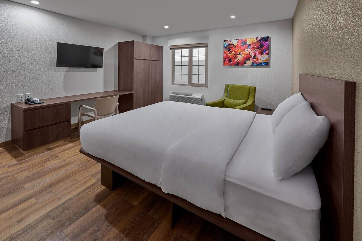 Desk, blackout drapes, bed sheets