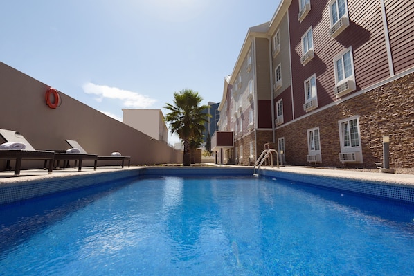 Outdoor pool, open 9:00 AM to 8:00 PM, pool umbrellas, sun loungers