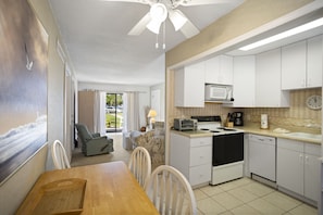Fridge, microwave, oven, stovetop - 🌊 Gulf Winds Ground-Floor 2BR — Courtyard Patio with Gulf View & Budget-Friendly Comfort (ST PETE BEACH)