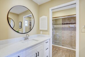 Bathtub, hair dryer, towels