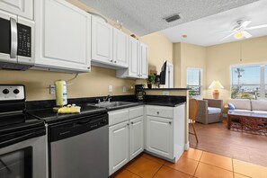 Fridge, microwave, oven, stovetop - Madeira Bay Resort #416 – Family-Friendly Two-Bedroom Condo with Bunk Beds & Hard Surface Floors (Madeira Beach)