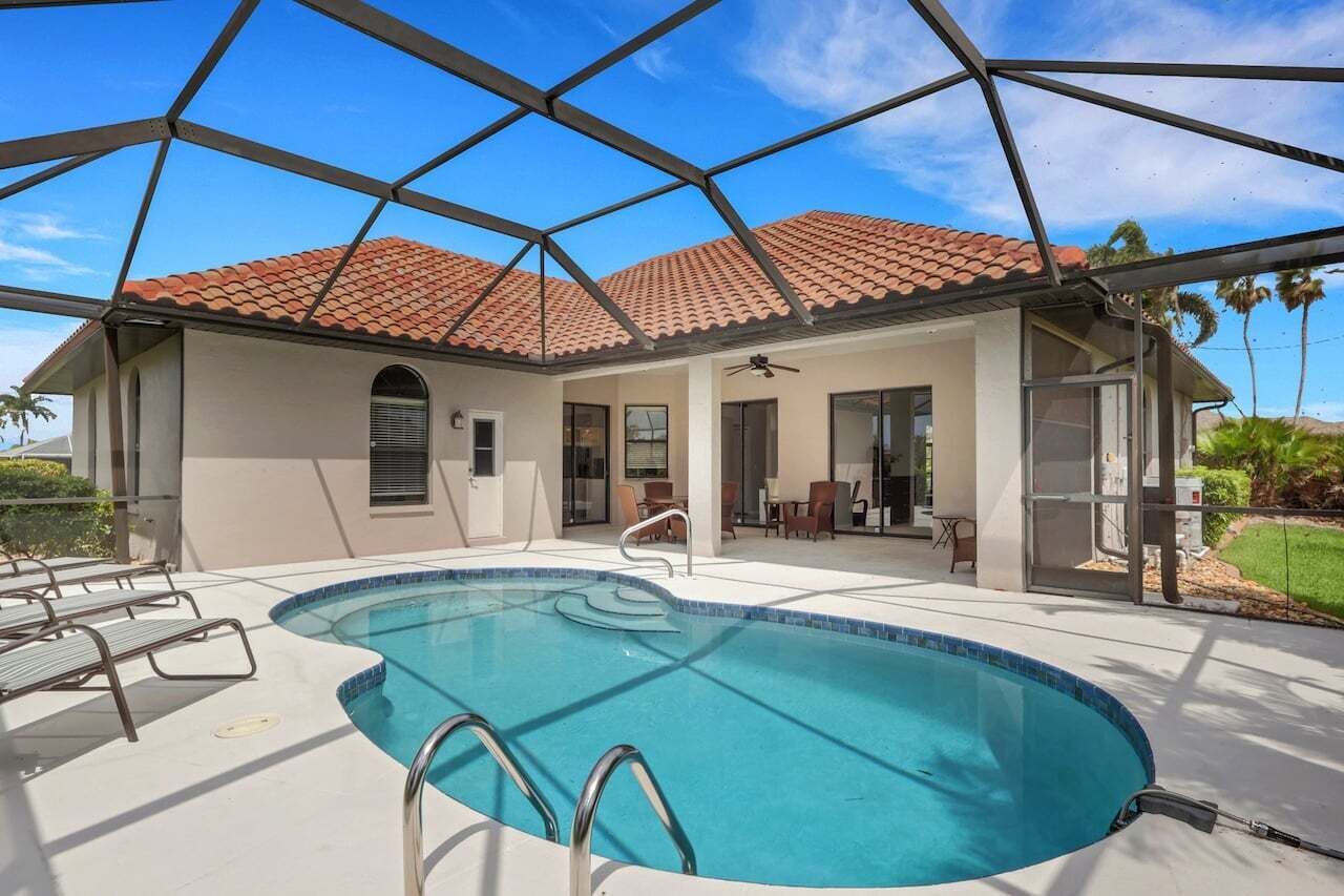 A heated pool, pool loungers