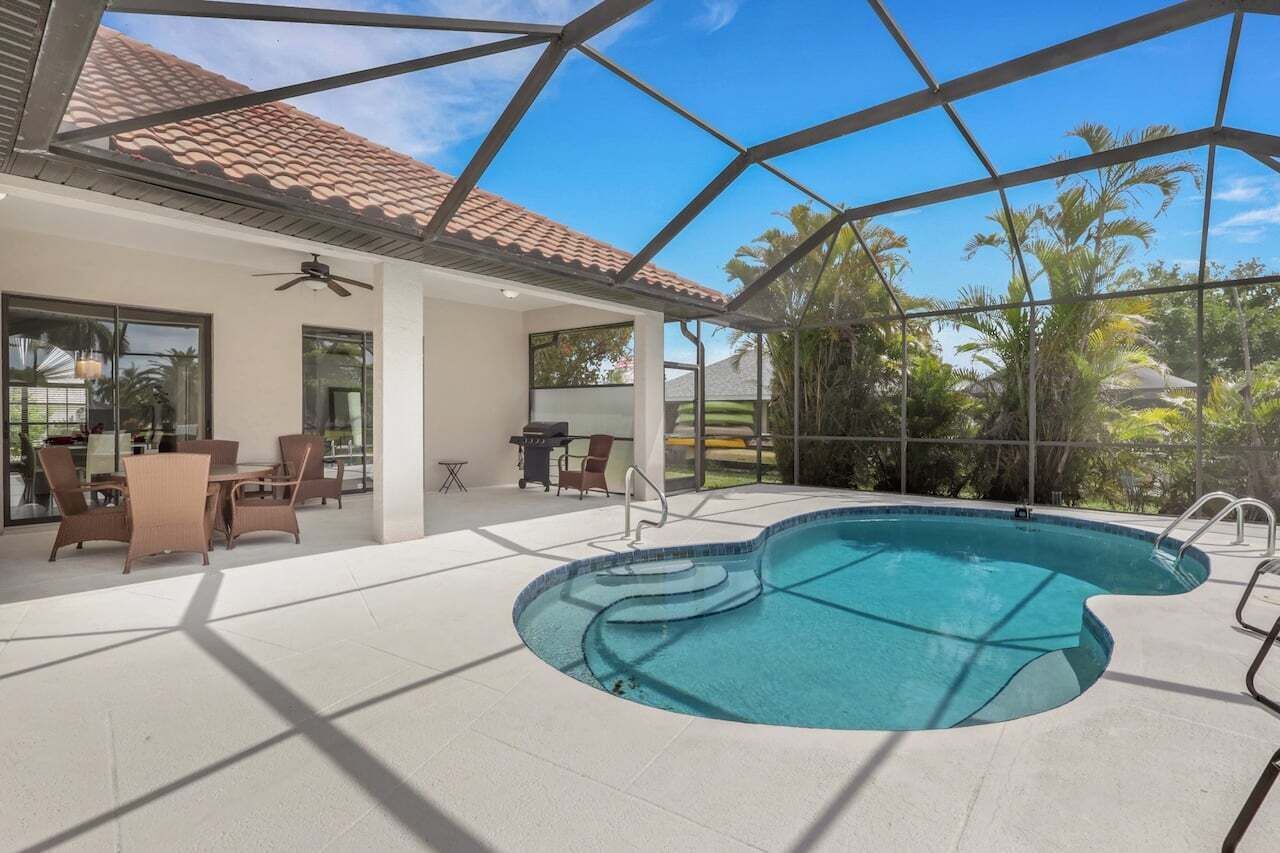 A heated pool, sun loungers