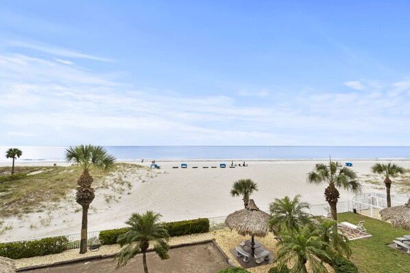 On the beach - Sea Breeze 203 | Spacious Gulf-Front Retreat with Balcony Sunsets (Madeira Beach)