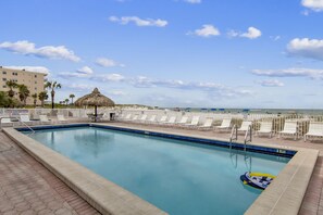 A heated pool - Sea Breeze 203 | Spacious Gulf-Front Retreat with Balcony Sunsets (Madeira Beach)