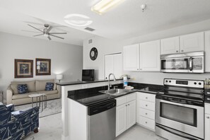 Fridge, microwave, oven, stovetop - 🌅 Madeira Bay Resort #413 – Spacious Two-Bedroom Retreat with Dual Balconies & Marina Views (Madeira Beach)