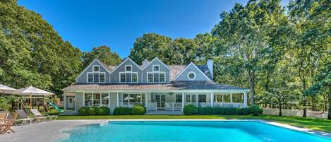 A heated pool, sun loungers