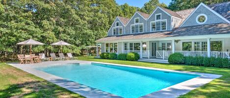 A heated pool, sun loungers