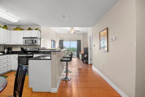 Fridge, microwave, oven, stovetop - 🌅 Madeira Bay Resort #415 – Stylish Two-Bedroom Condo with Sleeper Sofa & Private Balcony (Madeira Beach)