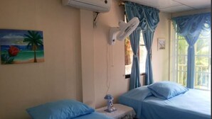 أغطية فراش متميزة ومكواة/لوح كي وواي فاي مجانًا وملاءات أسرّة