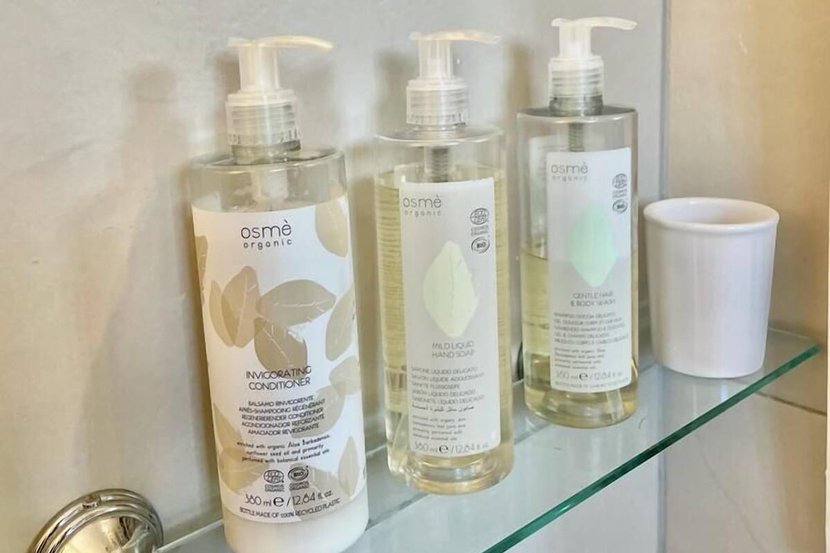 standard quadruple room, hill view | bathroom | shower, free toiletries, hair dryer, towels