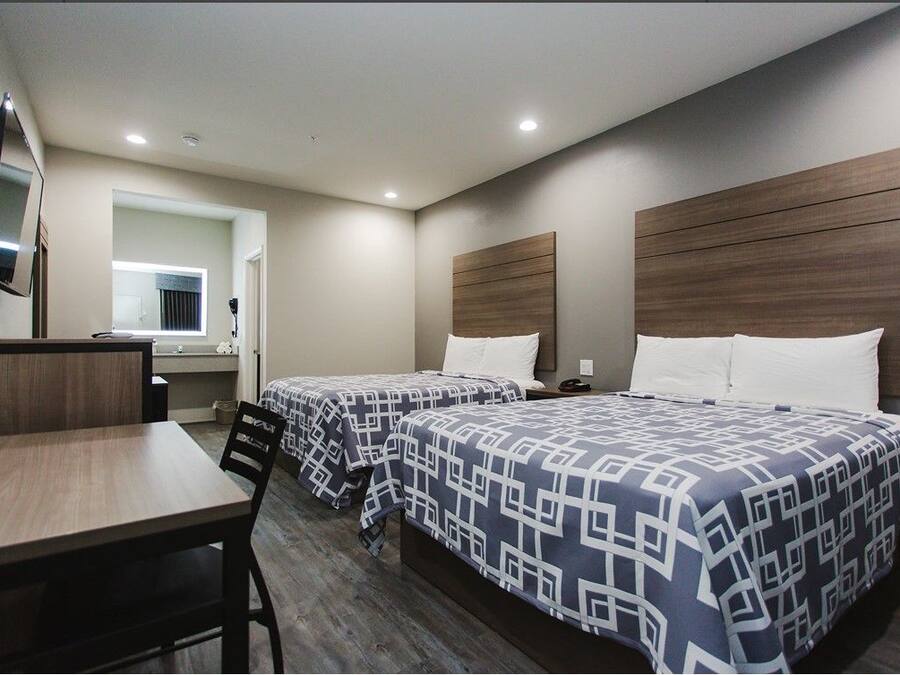 Standard Room, 2 Queen Beds | Desk, blackout curtains, iron/ironing board (on request), free WiFi
