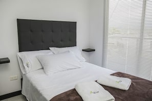 Departamento familiar, 2 habitaciones | 2 habitaciones, caja de seguridad en la habitación y muebles diferentes