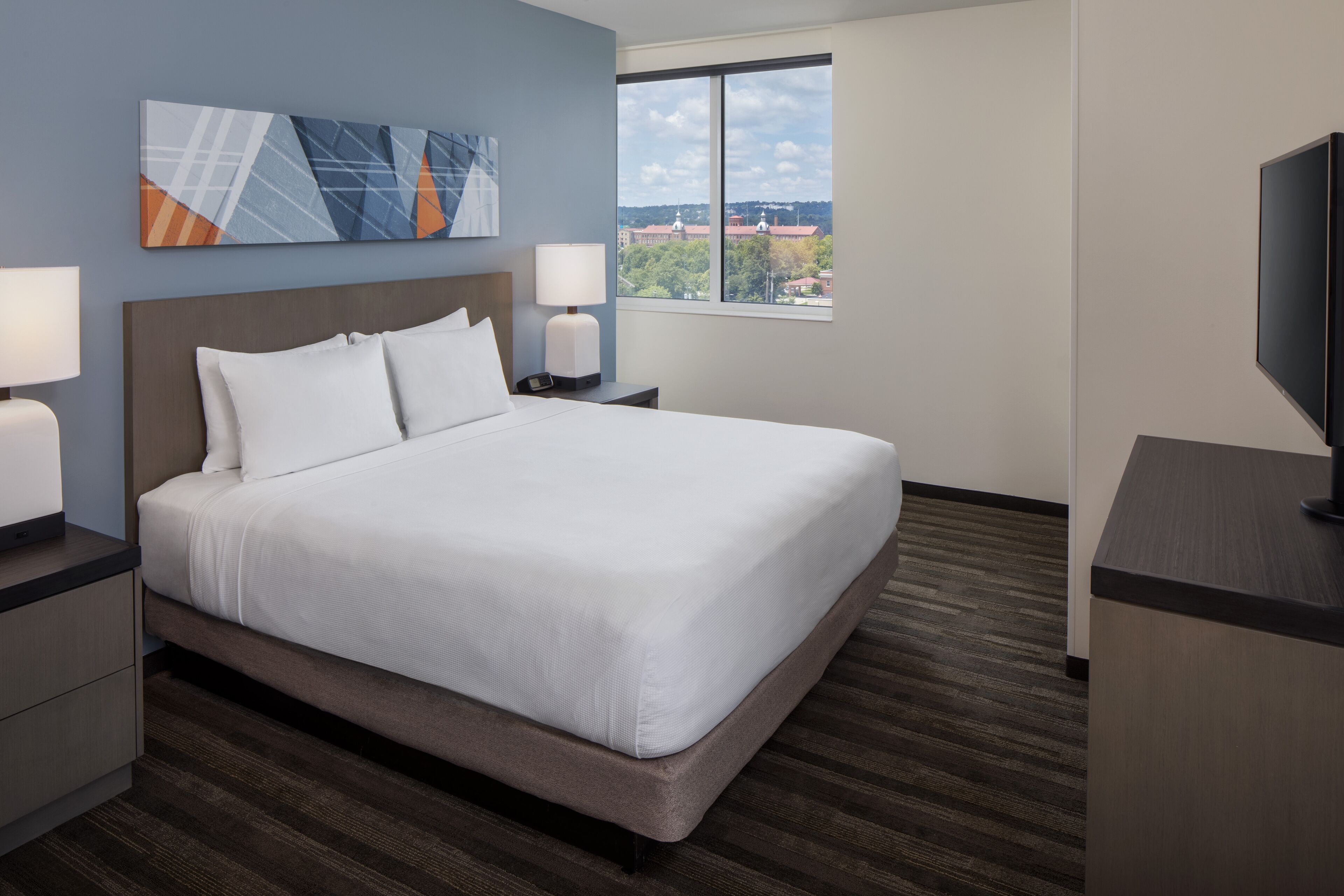 suite, 2 bedrooms (1 king bed, 2 queen beds) | blackout curtains, iron/ironing board, free wifi, bed sheets