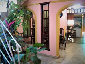 Enjoy meals in the dining area with a table and chairs.