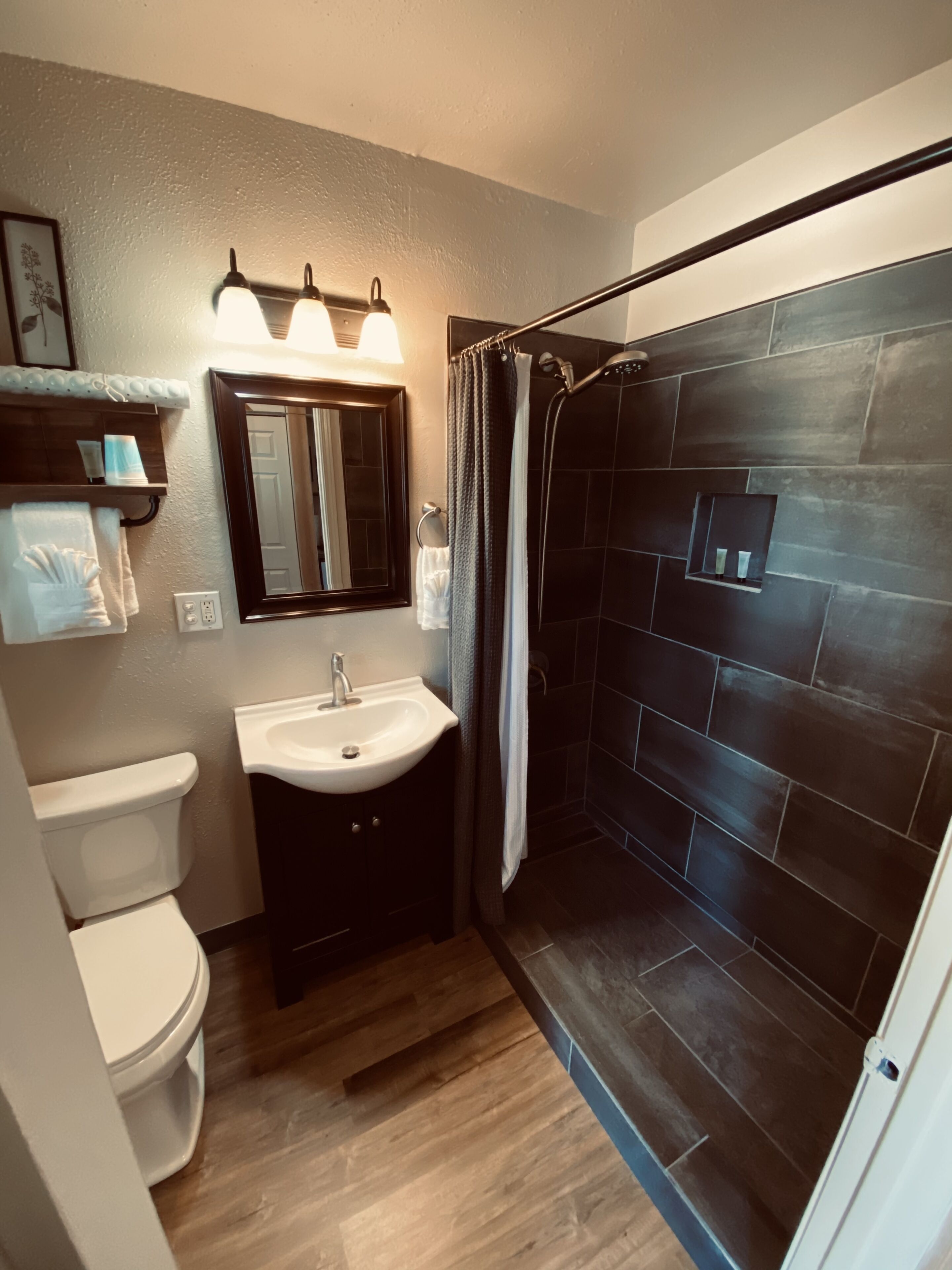 deluxe double room, 2 queen beds | bathroom | shower, rainfall showerhead, free toiletries, towels