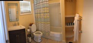 Suite, 1 King Bed with Sofa bed, Non Smoking, Sea View | Bathroom | Combined shower/tub, free toiletries, hair dryer, towels