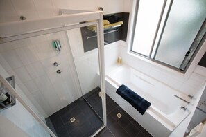 Bathtub, hair dryer, towels
