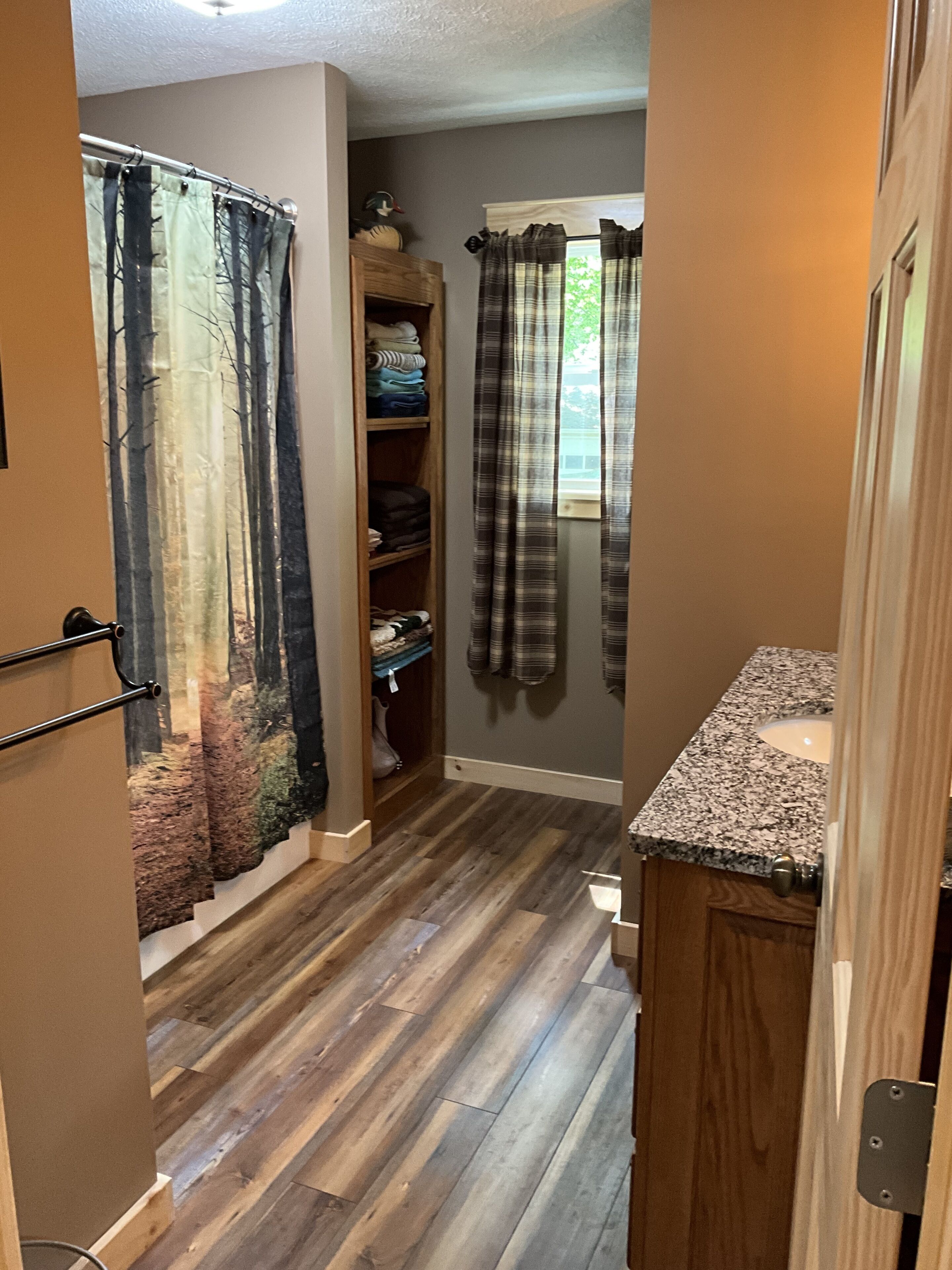 Shower, towels, soap, toilet paper