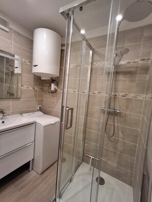 Hair dryer, towels, soap, shampoo