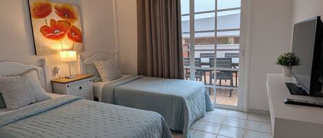 2 bedrooms, in-room safe, iron/ironing board, travel cot