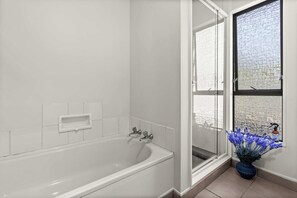Shower, hair dryer, towels, soap