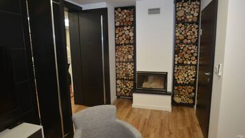Apartamento superluxo, 3 quartos | Sala de estar | Smart TV 55 polegadas com canais a cabo, TV, Netflix
