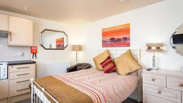 Fer et planche à repasser, Wi-Fi gratuit, draps fournis