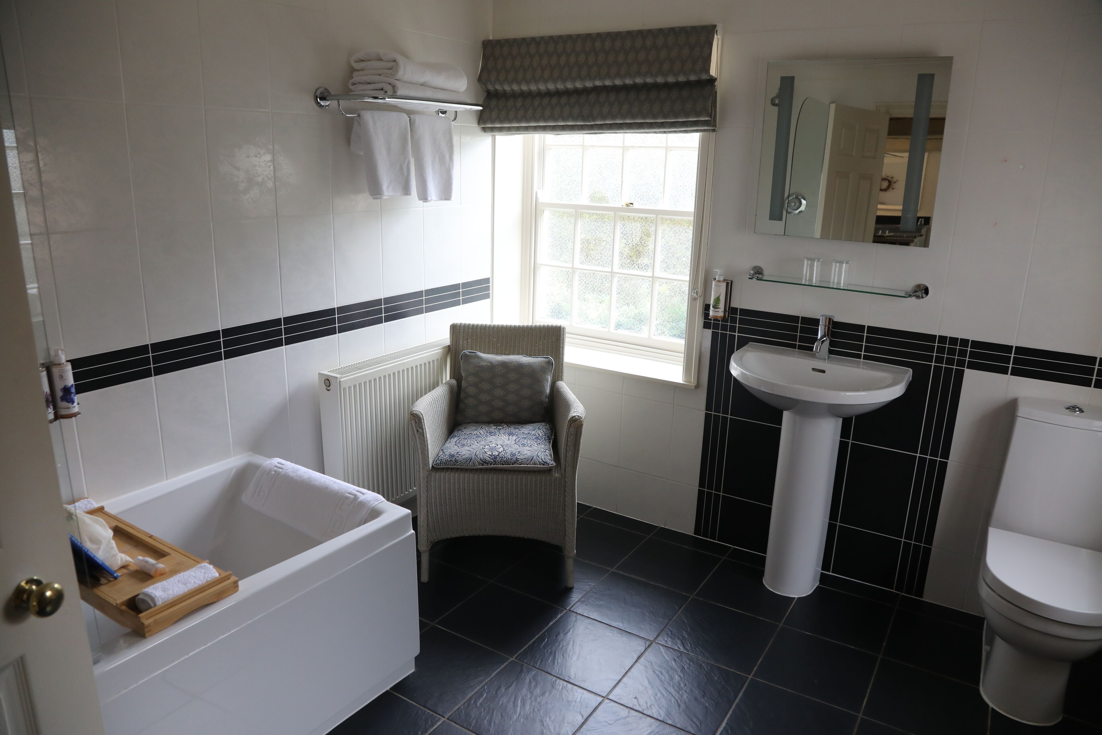 comfort studio suite, 1 king bed, garden area | bathroom | free toiletries, hair dryer, bathrobes, slippers