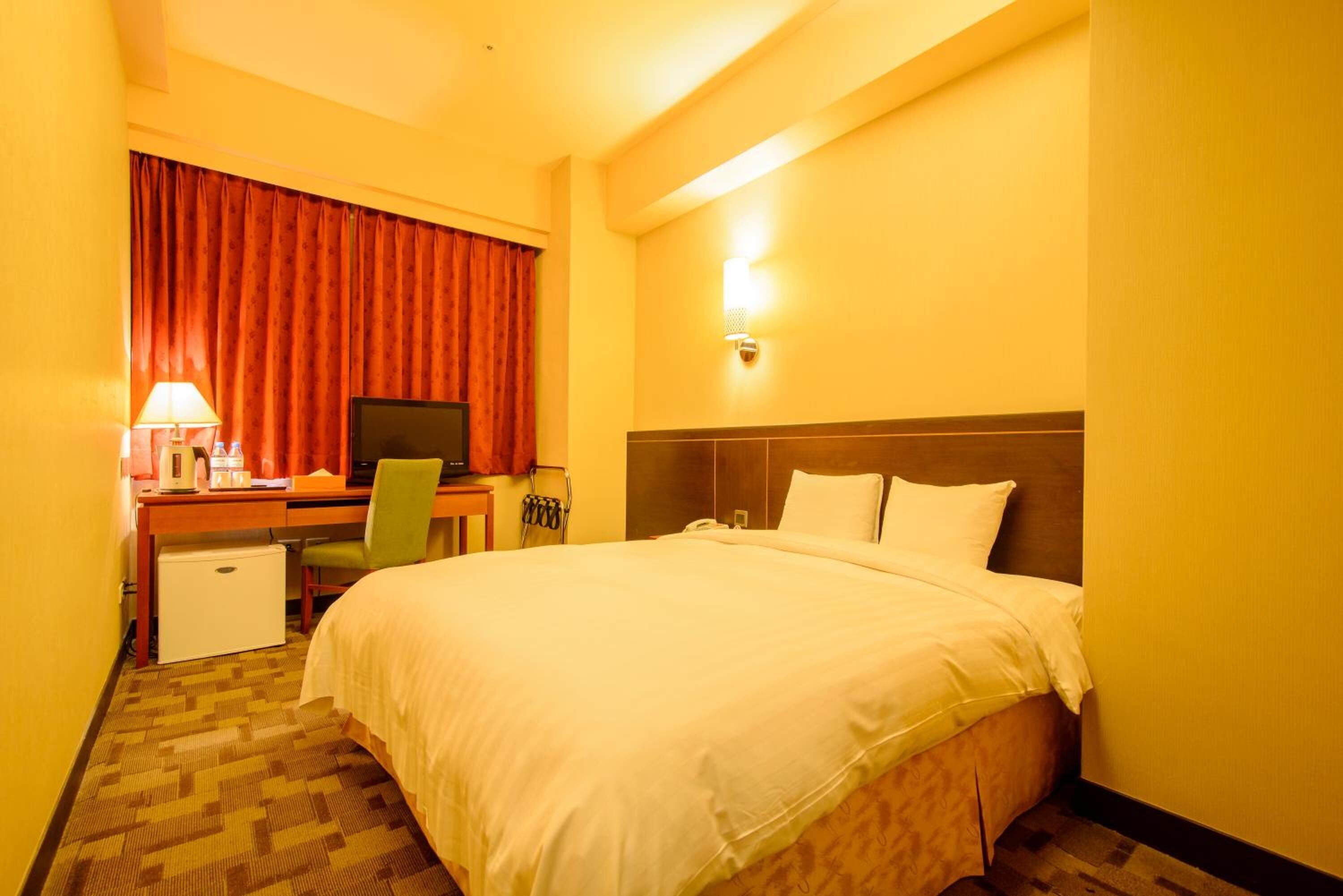 down duvets, desk, blackout curtains, iron/ironing board