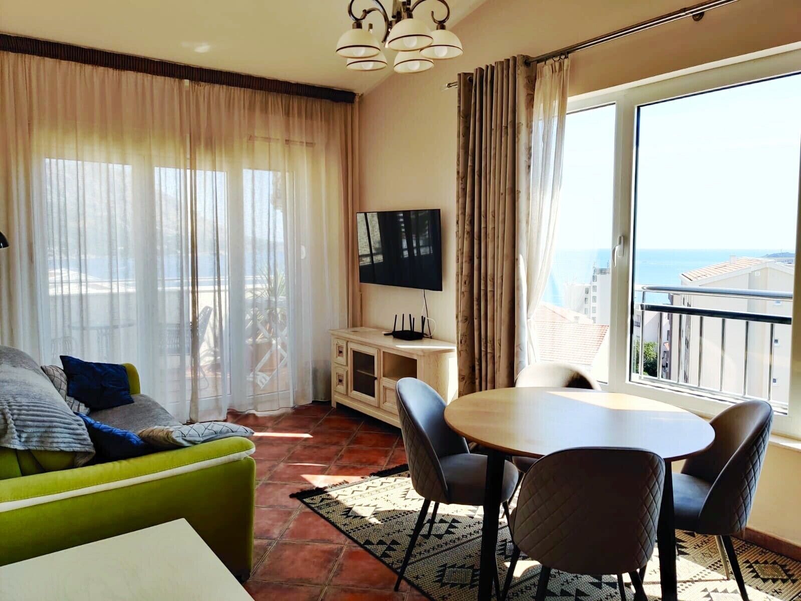 Phòng Deluxe, quang cảnh biển | Khu phòng khách | TV màn hình phẳng 