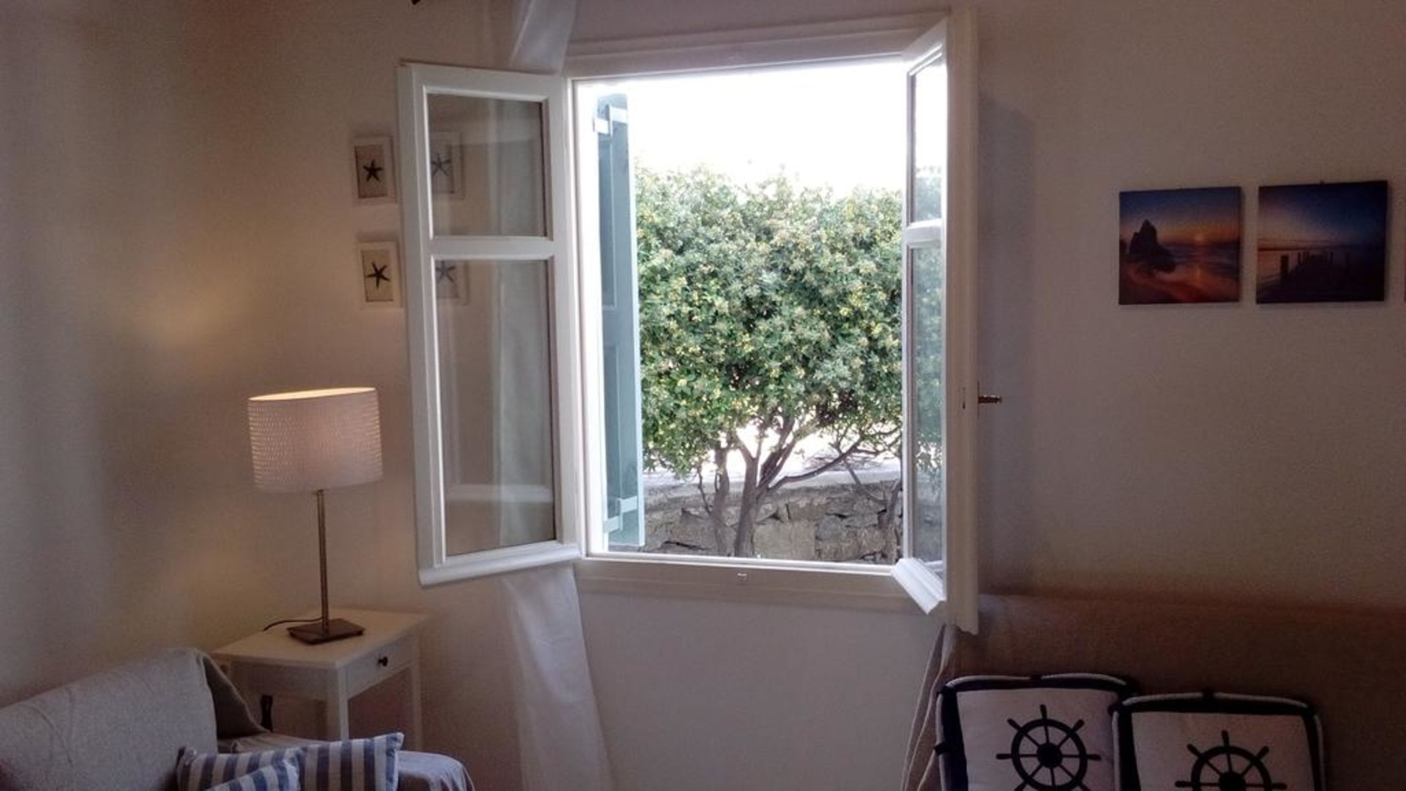 Apartment, Pool View | Living area | Flat-screen TV