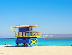 On the beach, sun loungers, beach umbrellas, beach towels