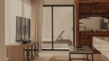 Two Bedroom Suite | Oppholdsområde | En 55-tommers smart-TV med Parabol-TV samt TV og Netflix