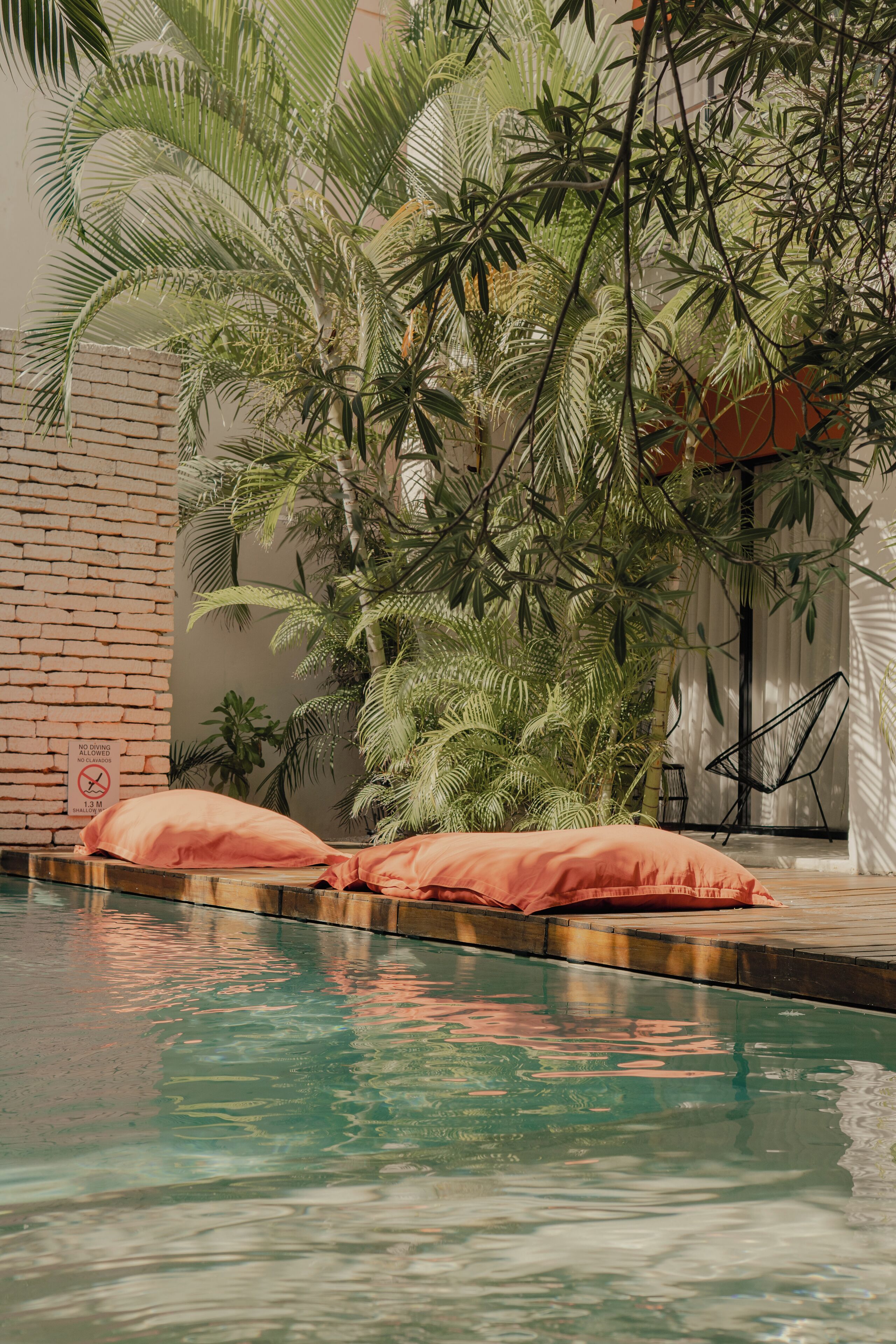 Outdoor pool, open 9 AM to 10:00 PM, pool loungers