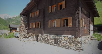 House in the middle of the Swiss Alps