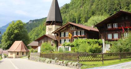 House in the middle of the Swiss Alps