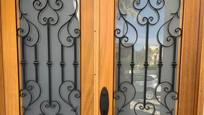 A wooden double door with intricate metalwork and a keyhole. - Amazing 6,000 sqft house sleeps 10, walk to Beach, Shops and Restaurants (San José del Cabo)