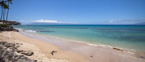 On the beach, sun loungers, beach towels