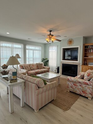 Smart TV, fireplace, DVD player, books
