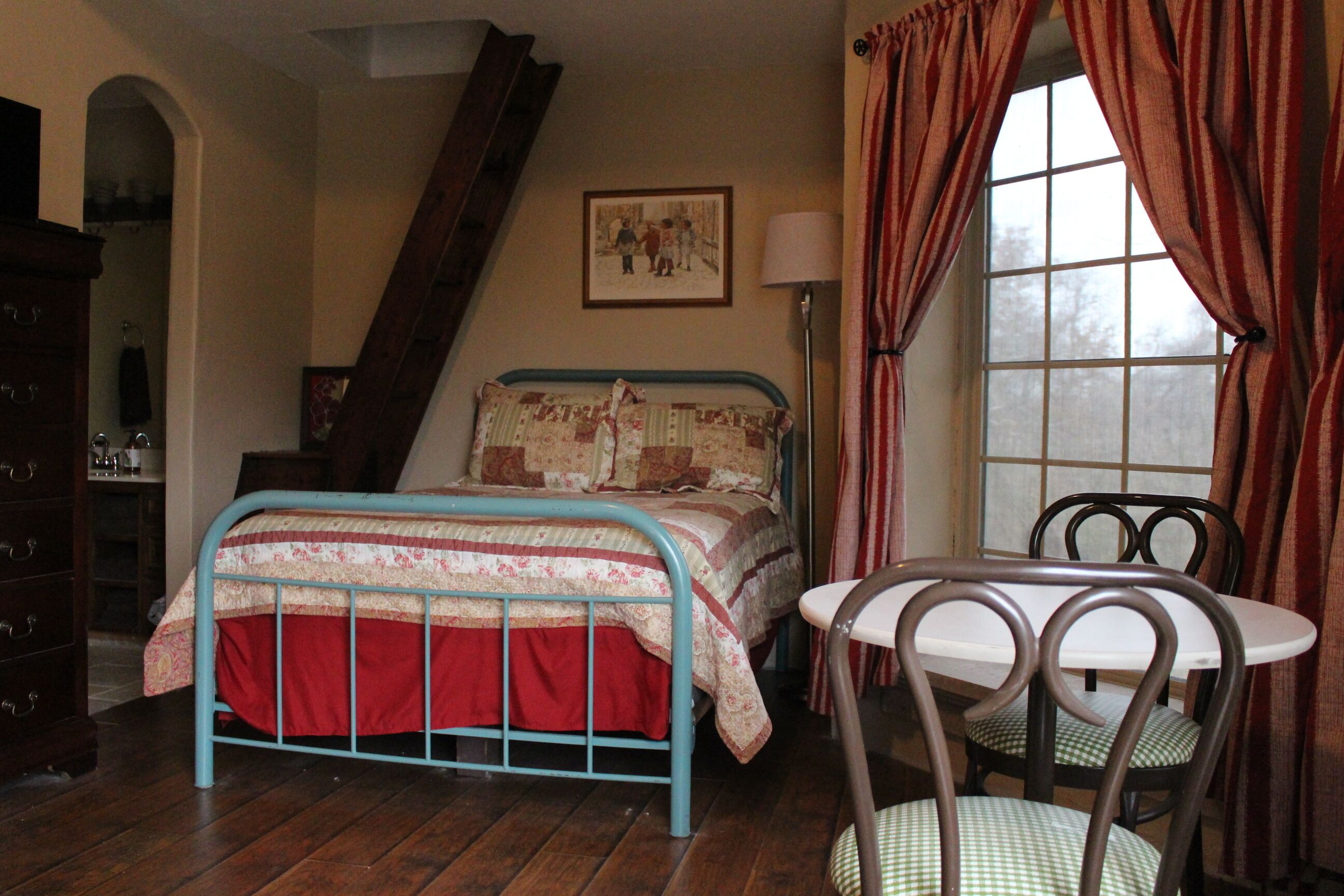 Bedroom connects to the previous shown by a jack and jill bath - fun loft !