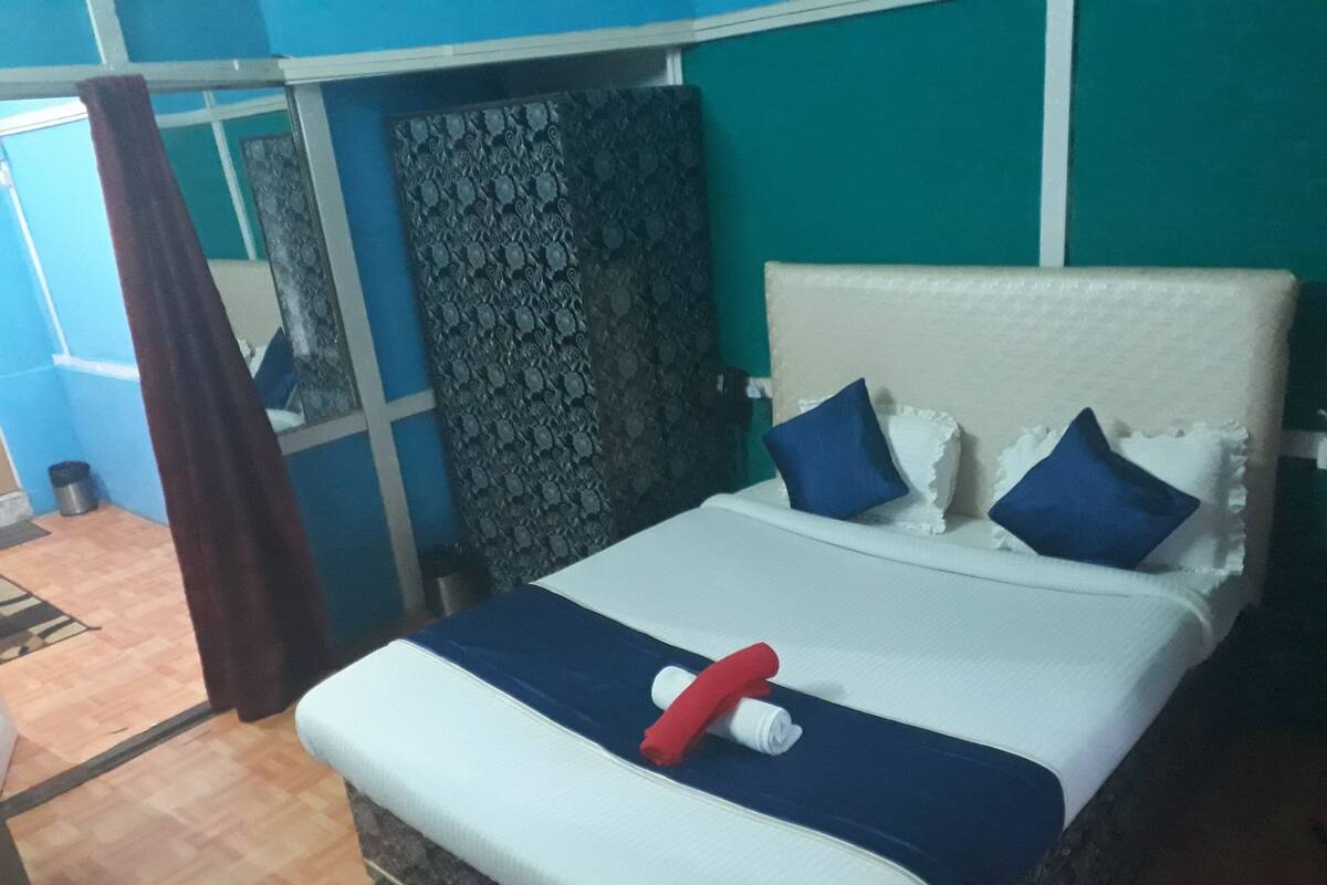 Blackout curtains, iron/ironing board, bed sheets