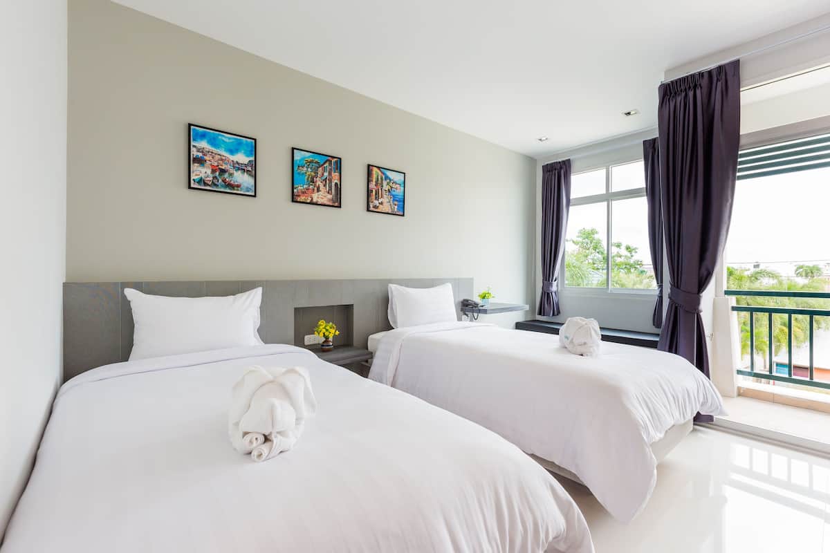 Chambre Supérieure avec lits jumeaux | Rideaux occultants, Wi-Fi gratuit, draps fournis